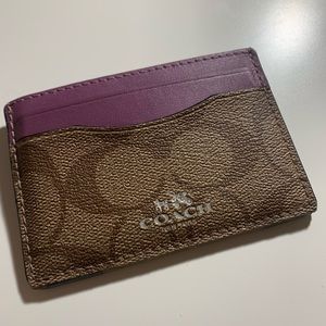 Used purple coach card holders!